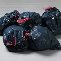 black garbage bag for junk removal