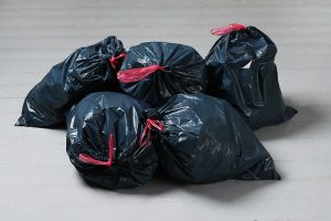 black garbage bag for junk removal